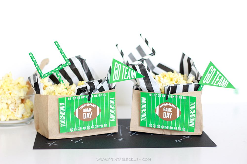 Create these easy Football Popcorn Bags with FREE Game Day Printables! They'd be perfect for your tailgating party!