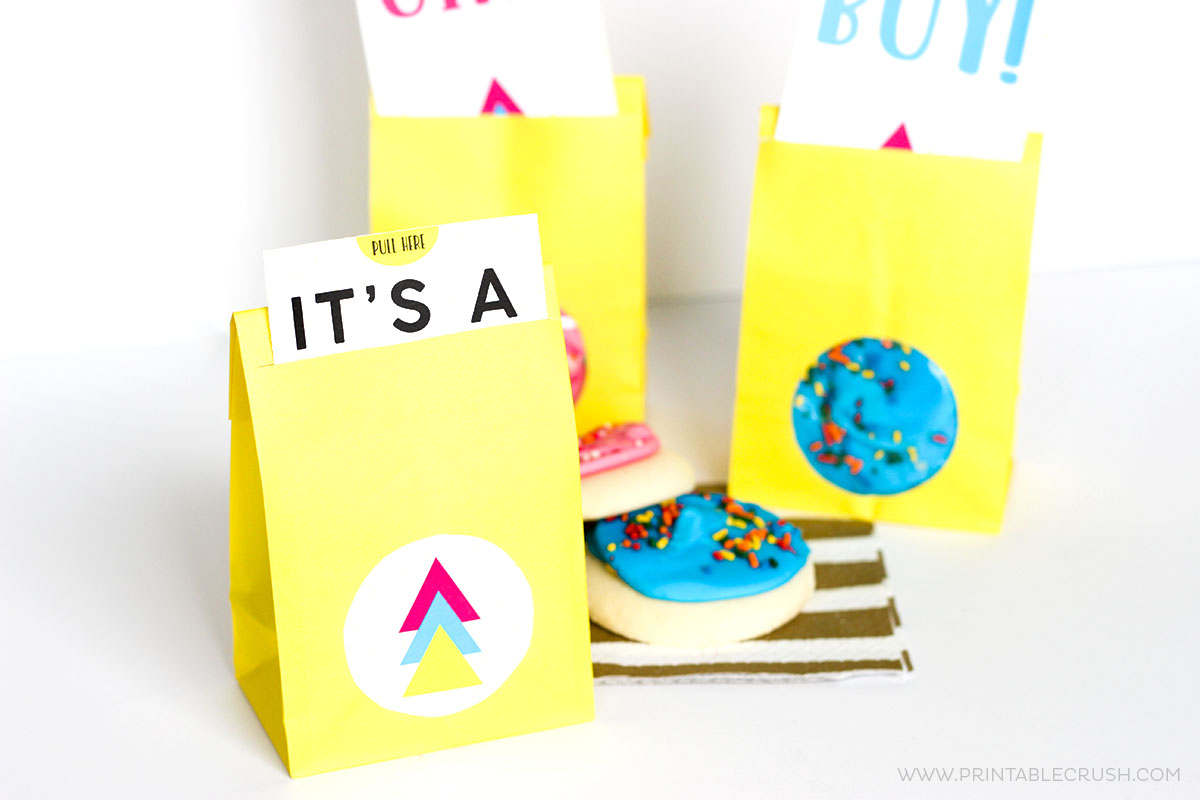 These FREE Printable Gender Reveal Party Favors are so cute for a gender reveal baby shower! Plus, they're super simple since you buy the sugar cookies at the store!