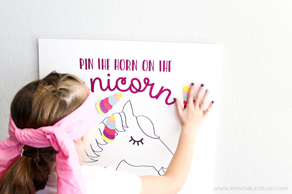 See this tutorial and download the FREE Cricut Cut Files for this Pin the Horn on the Unicorn Party Game. This new take on a classic game is a huge hit!