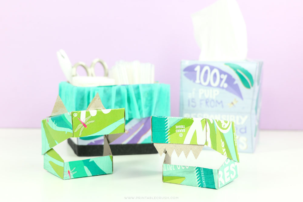 You can create so many fun recycled crafts this Earth Month - including these cute Dinosaur masks and craft supply storage box!